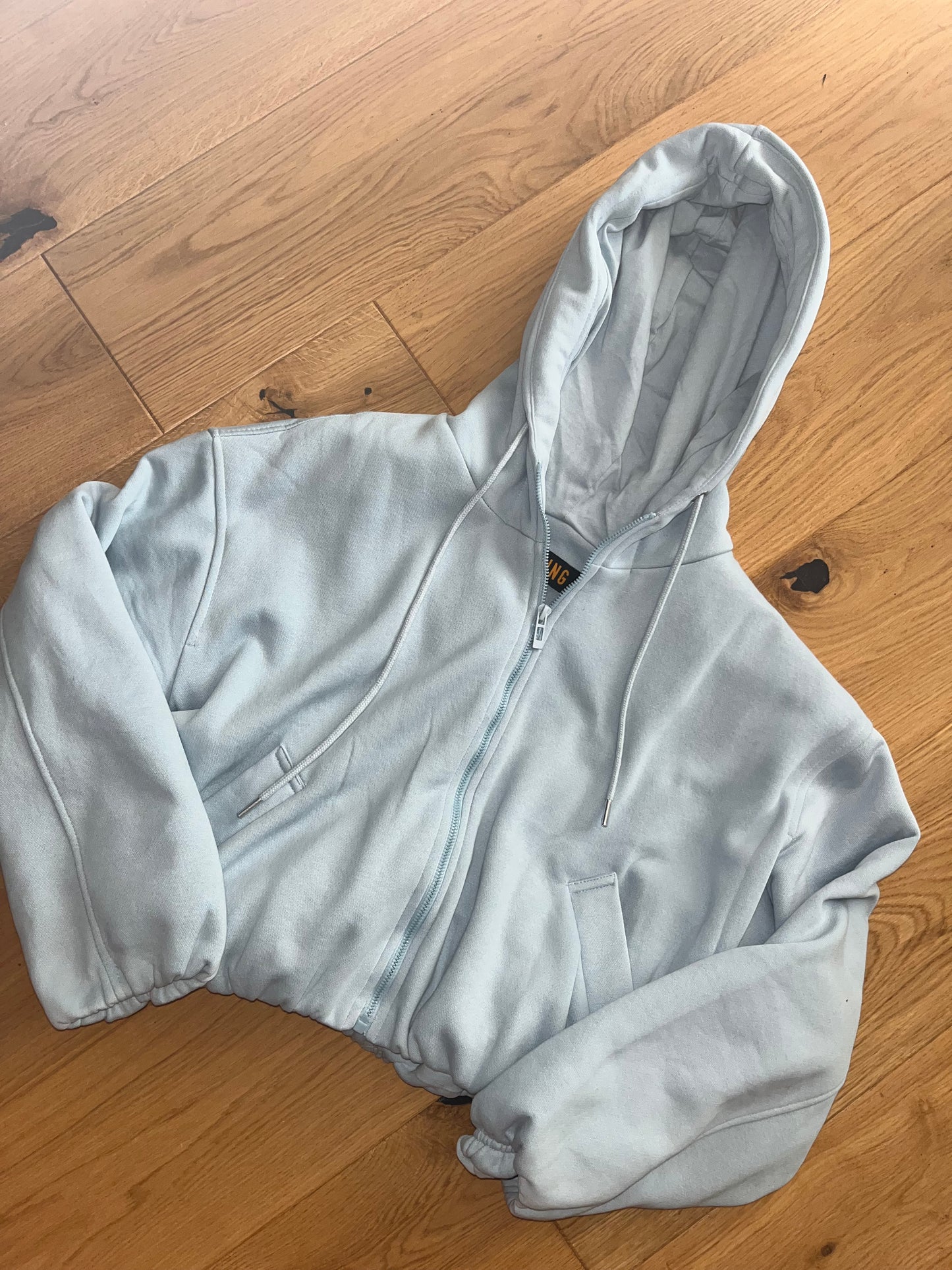 Bubble hem zip up cropped hoodies