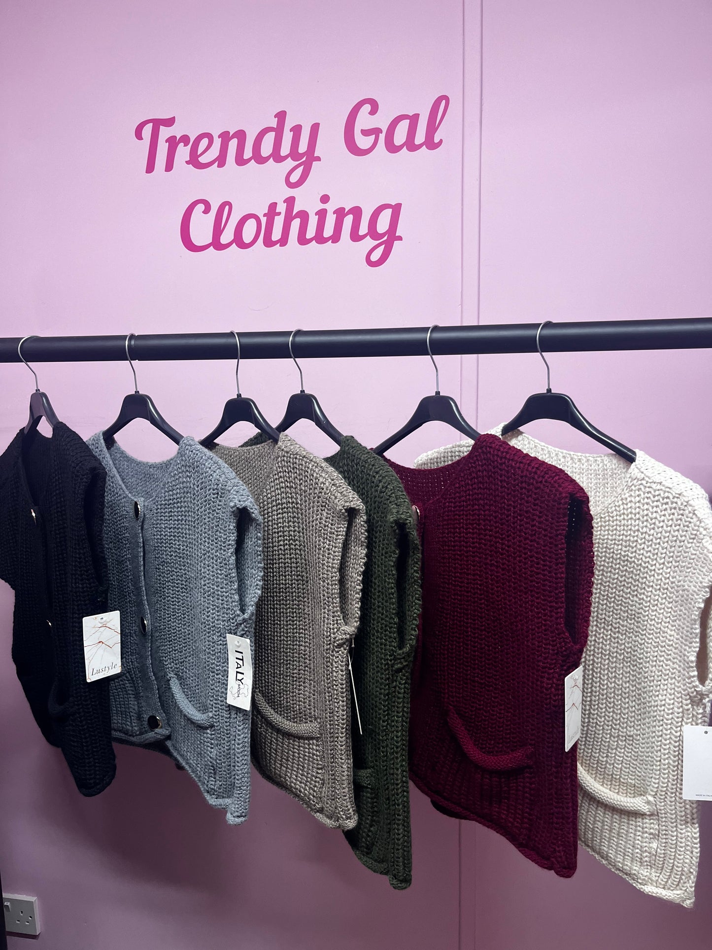 Soft knitted coloured waistcoats with pockets gold button detailing