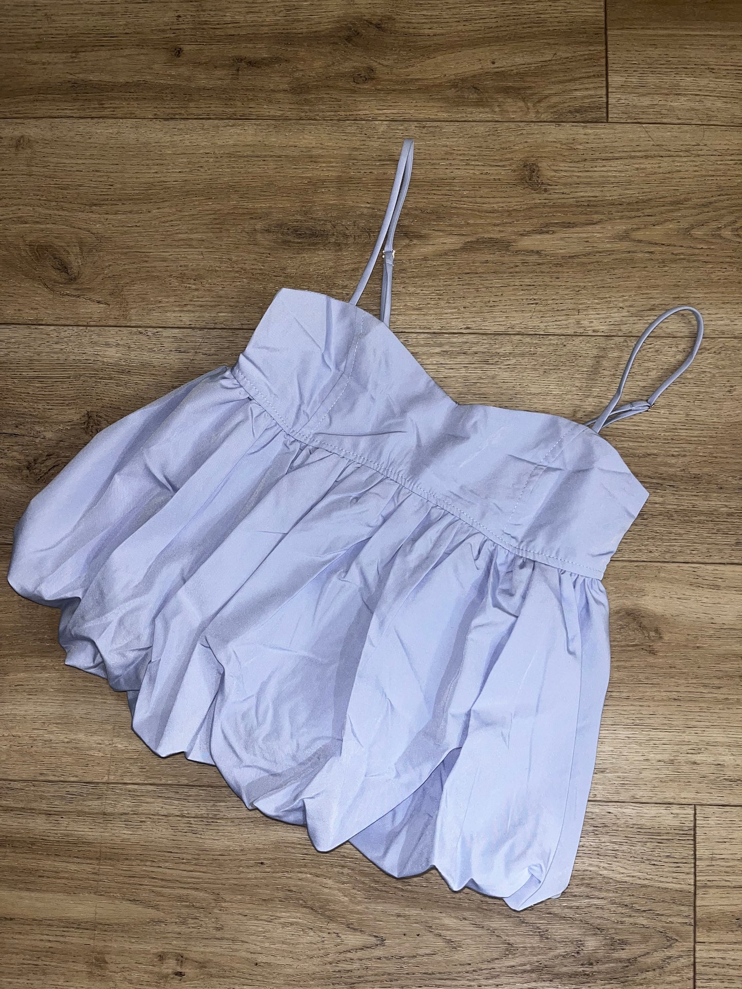 Strappy adjustable bubble hem tops