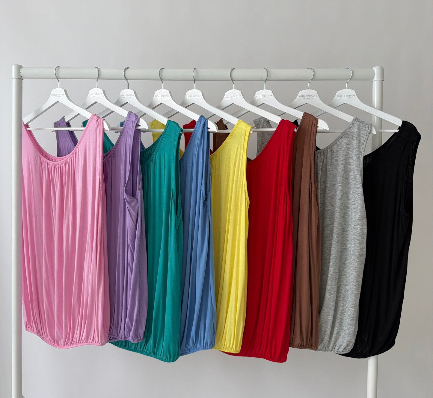 Lightweight coloured bubble hem vest tops