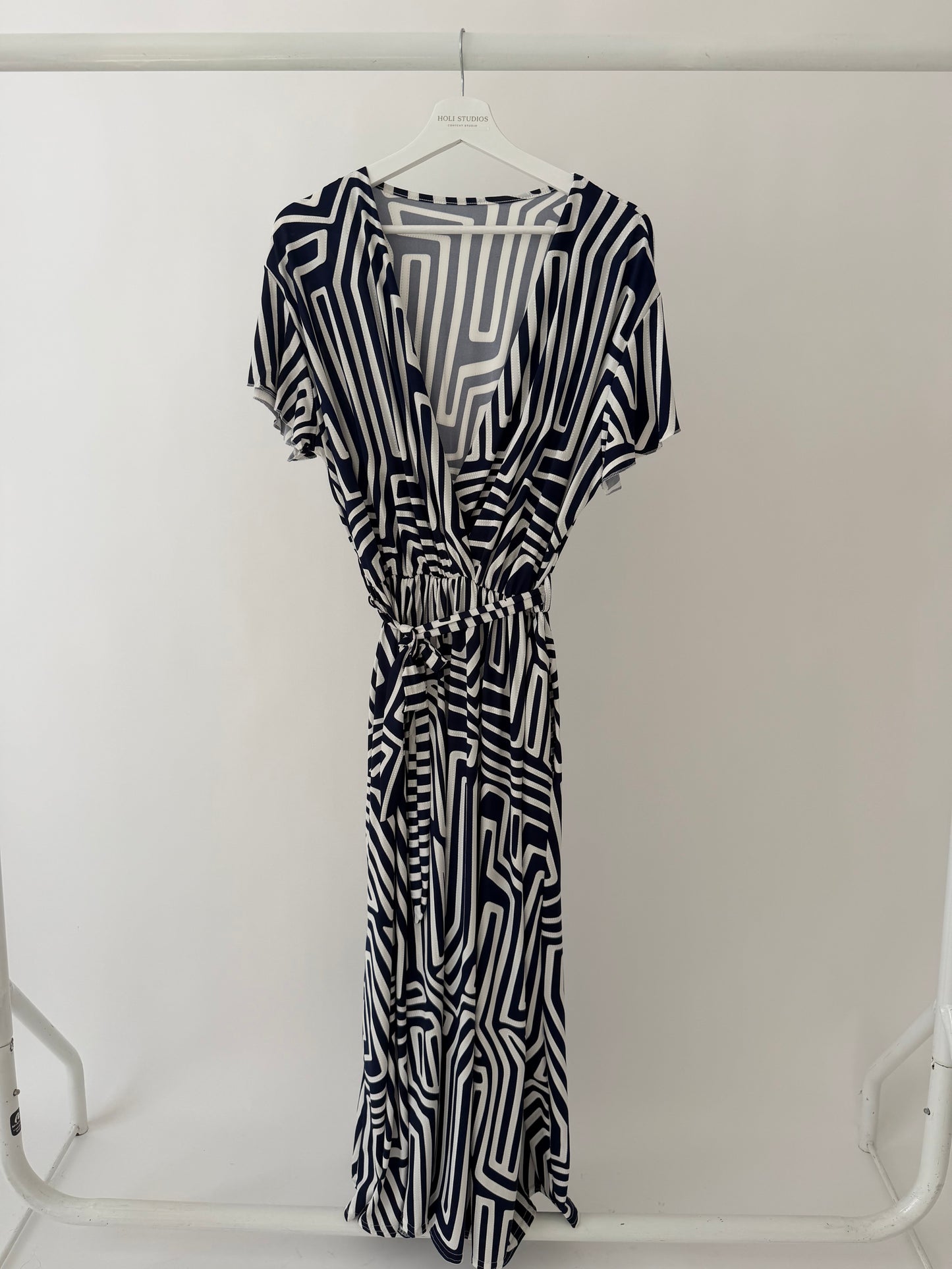 Navy and white geometric print wrap style maxi dress