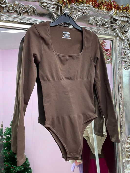Sculpting long sleeved bodysuits