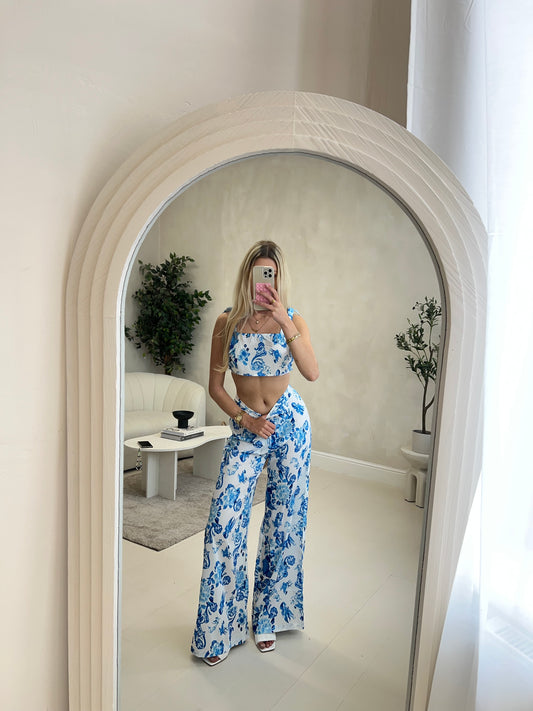 Floral white and blue shoulder tie crop top and trouser set