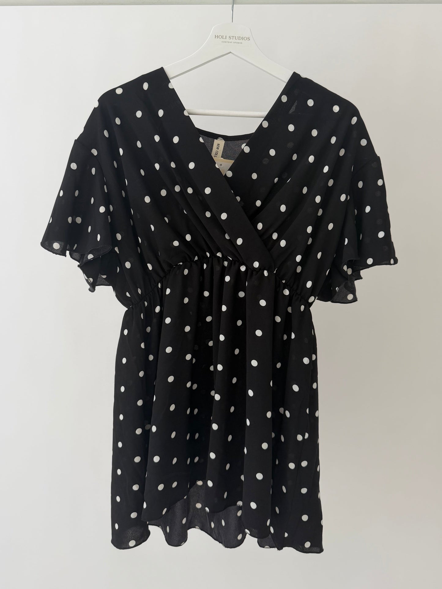Polka dot wrap style top