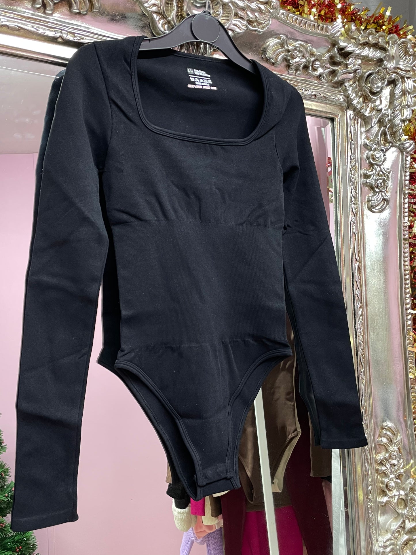 Sculpting long sleeved bodysuits