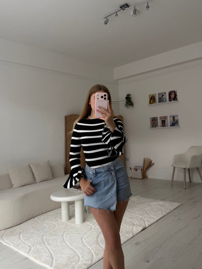 Stripey ribbed full length top with ruffle cuff