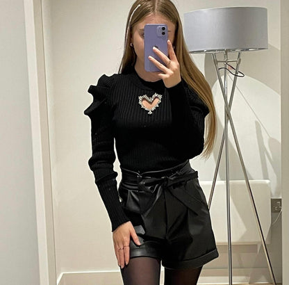 Long sleeved ribbed top with heart embellished rhinestone cut out