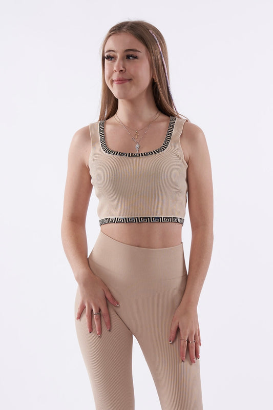 Beige ribbed crop top with black pattern trim